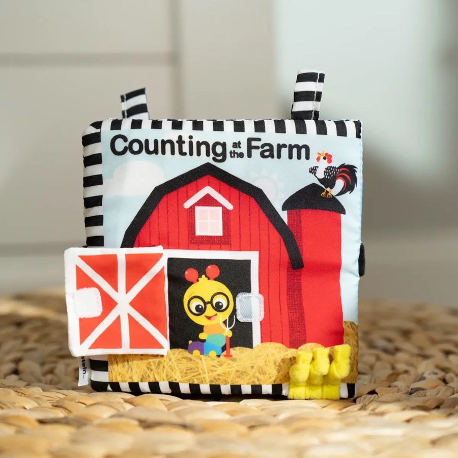 Baby Einstein: libro sensorial de tela Farm Explorers